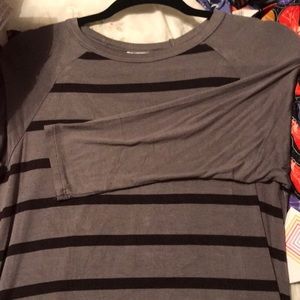 Reserved red hibiscus Lularoe randy